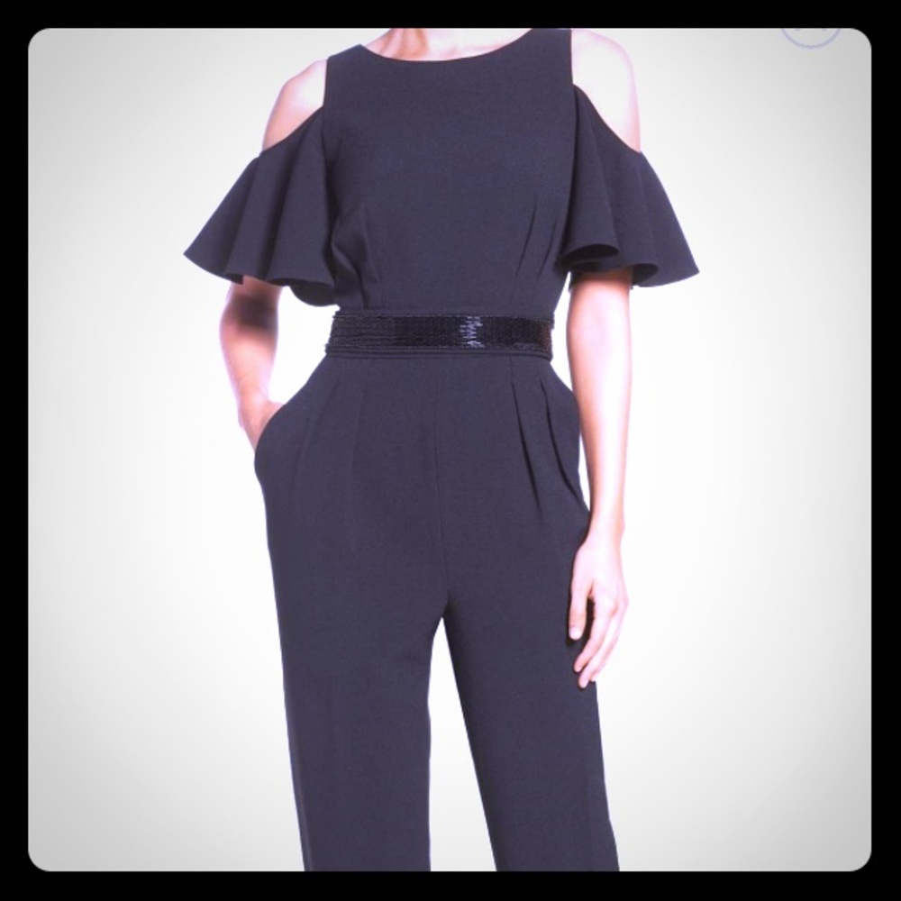 Super classy black jumpsuit with sequence belt.